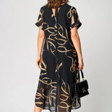 Rochie Aerisită cu Designuri Liniare și Decolteu în V