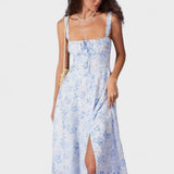 Renata | O Rochie Midi Albastră cu Imprimeu Floral, Decolteu Pătrat și Franzit"