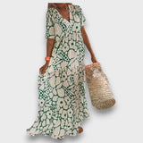 Rochie lungă cu model floral și nasturi