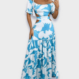 Rochie care evidențiază silueta, realizată dintr-un material luxos