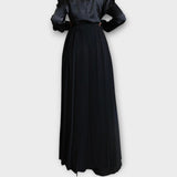 Pantaloni largi cu pliuri și înfășurare