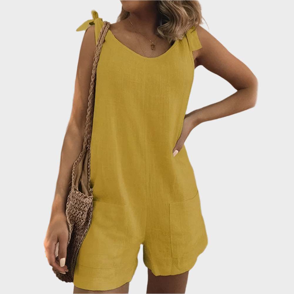 Salopetă lungă cu bretele cu fundițe și buzunare