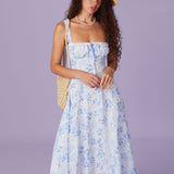 Renata | O Rochie Midi Albastră cu Imprimeu Floral, Decolteu Pătrat și Franzit"